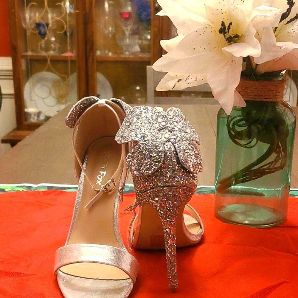 Size 7 US Size 39 European special occasion silver shoe.